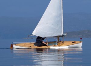 Decked sailing canoe