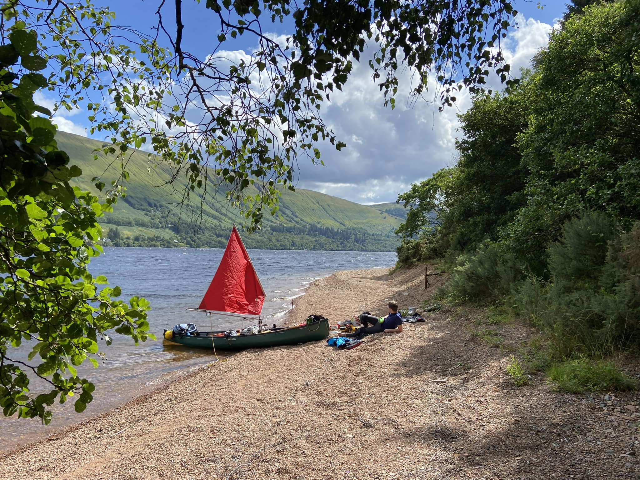 sailing canoe expedition on large loch