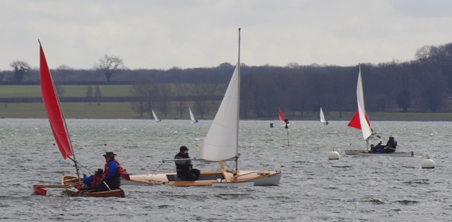 3 sailing canoes on Rutland Water